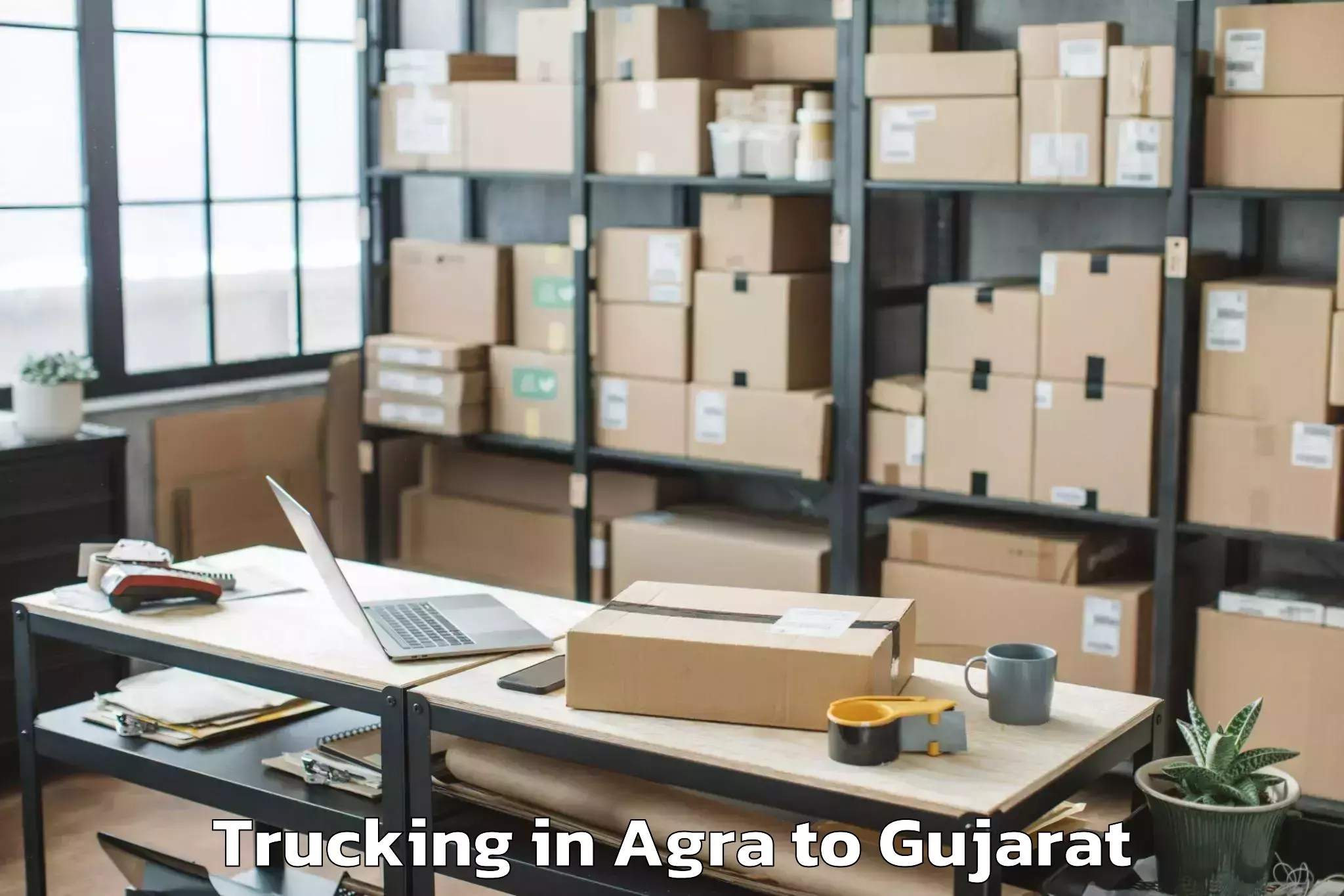 Book Agra to Sachin Trucking Online